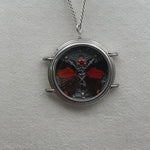Load and play video in Gallery viewer, Black &amp; Orange Butterfly Necklace

